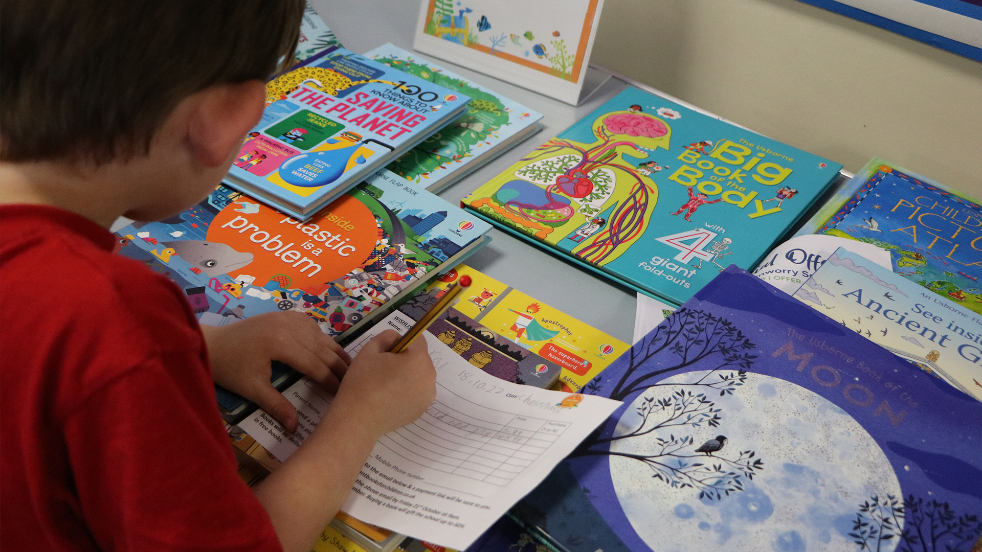 Child at a school book fair